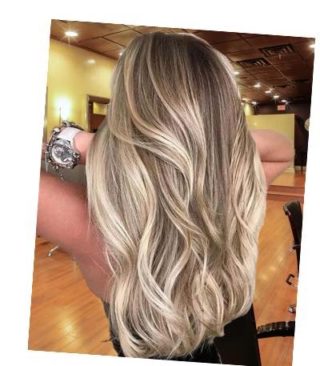 Indulge in the captivating beauty of ombré, where shades blend effortlessly for a striking visual impact. Our talented team will create a seamless transition of colors, turning your hair into a work of art.